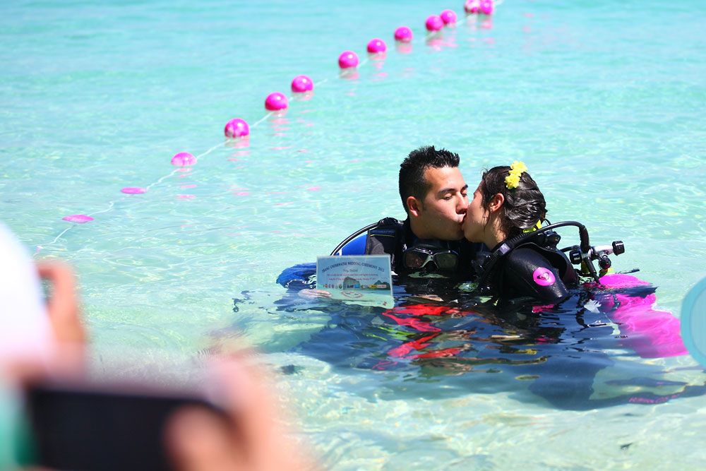 Participants of the annual underwater wedding held off Koh Kradan, Trang.